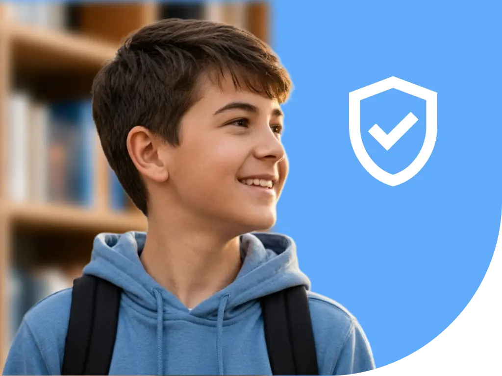 Student in a blue frame with a bookshelf behind him